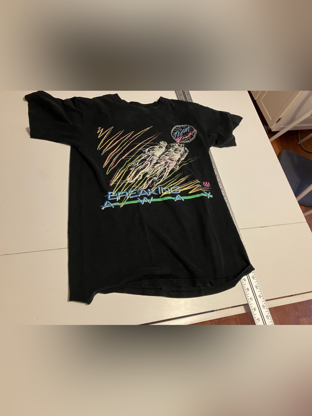 Black Graphic Tee with Neon Surfing Design
